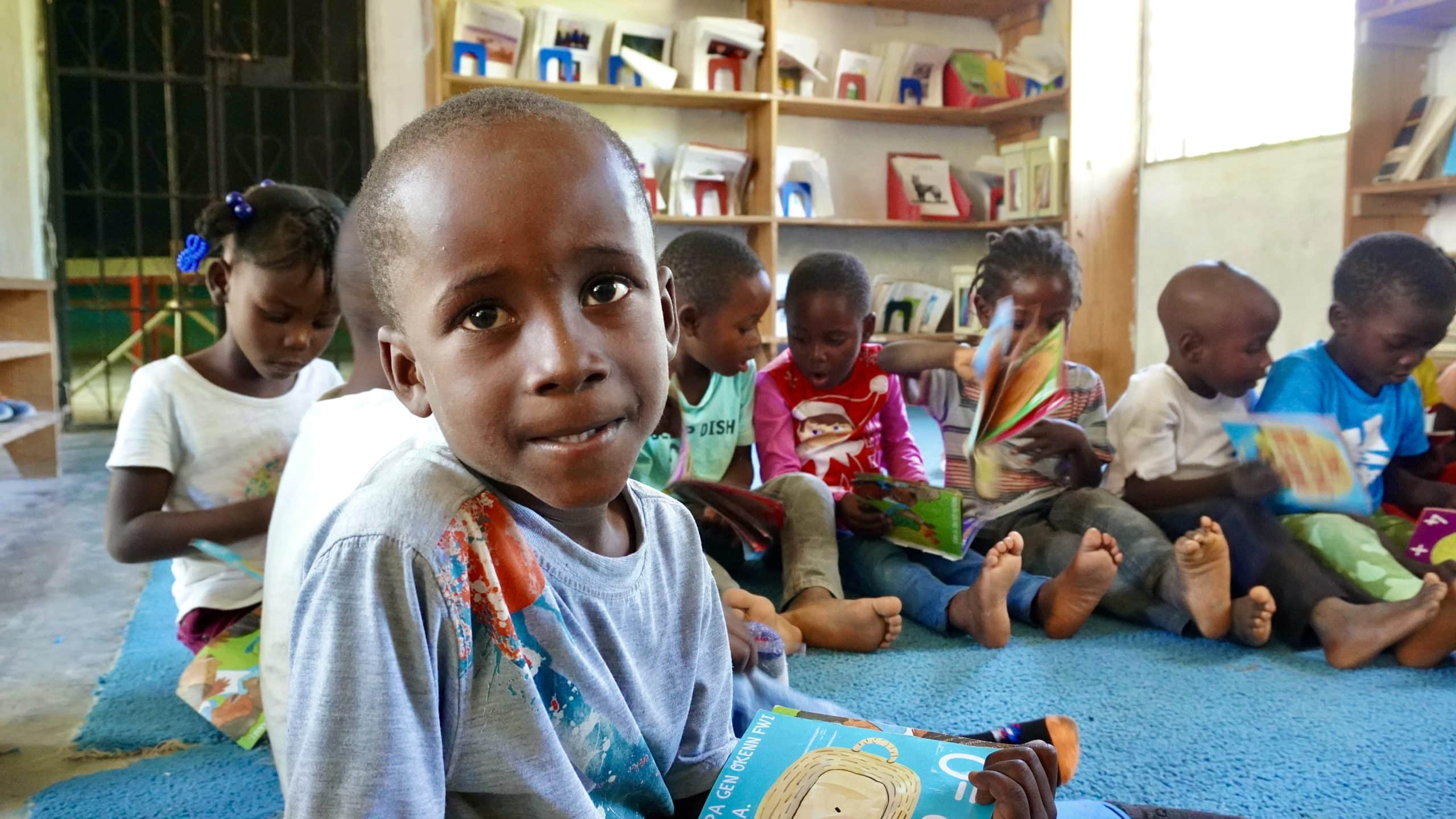 Students reading in the MCLC library.