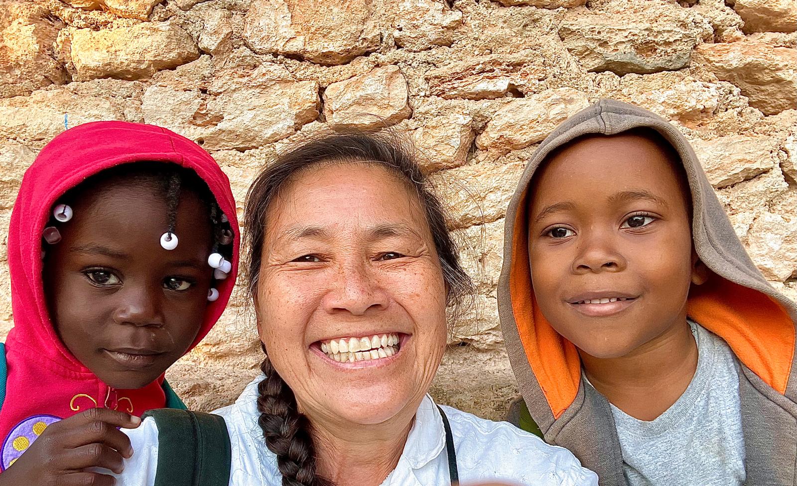 Chris and two students at MCLC.